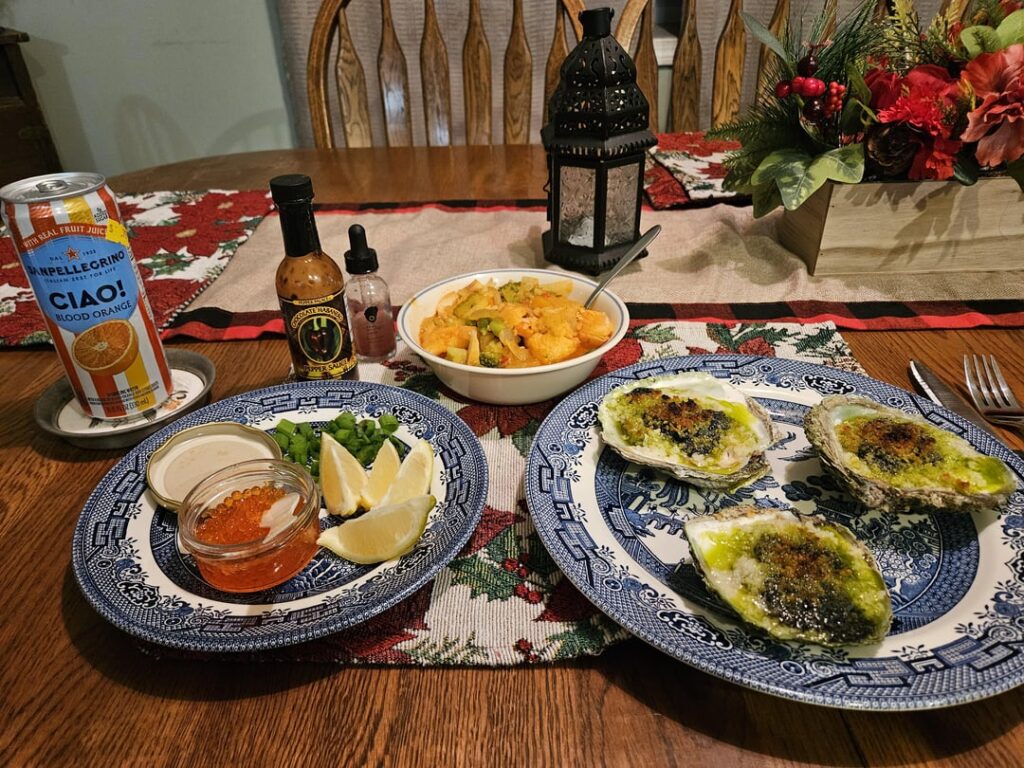 Broiled Belons with different toppings (me) and amazing fish curry (wife)