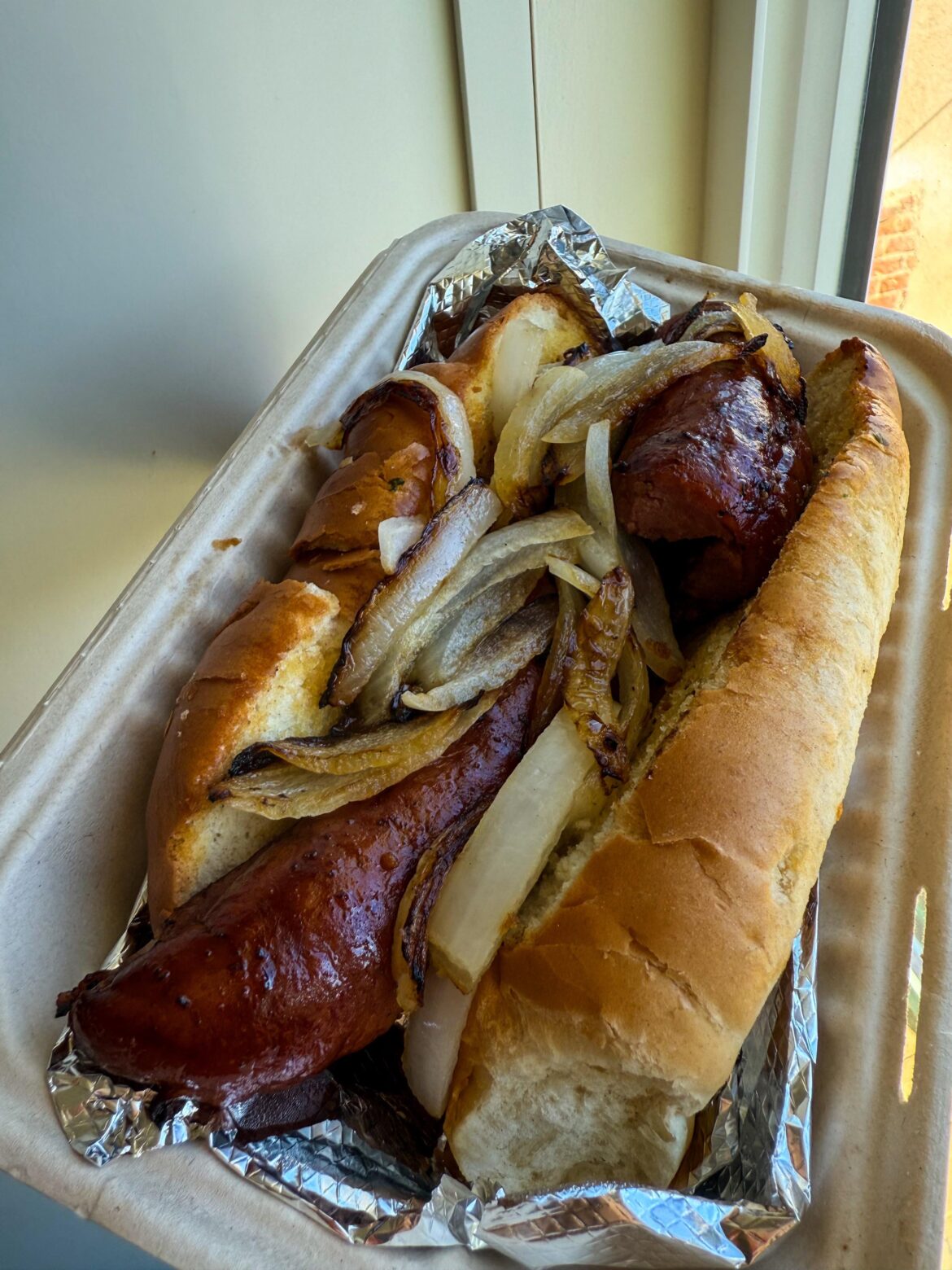 Sausage sandwich with onions