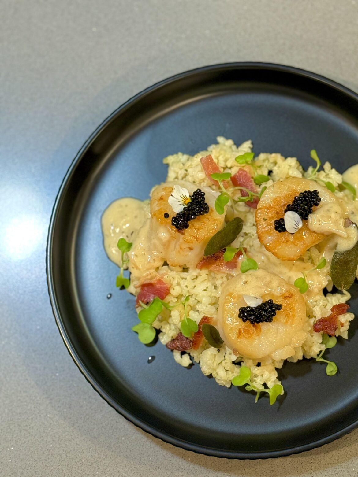 Scallops, beurre blanc, Parmesan risotto, sturgeon caviar