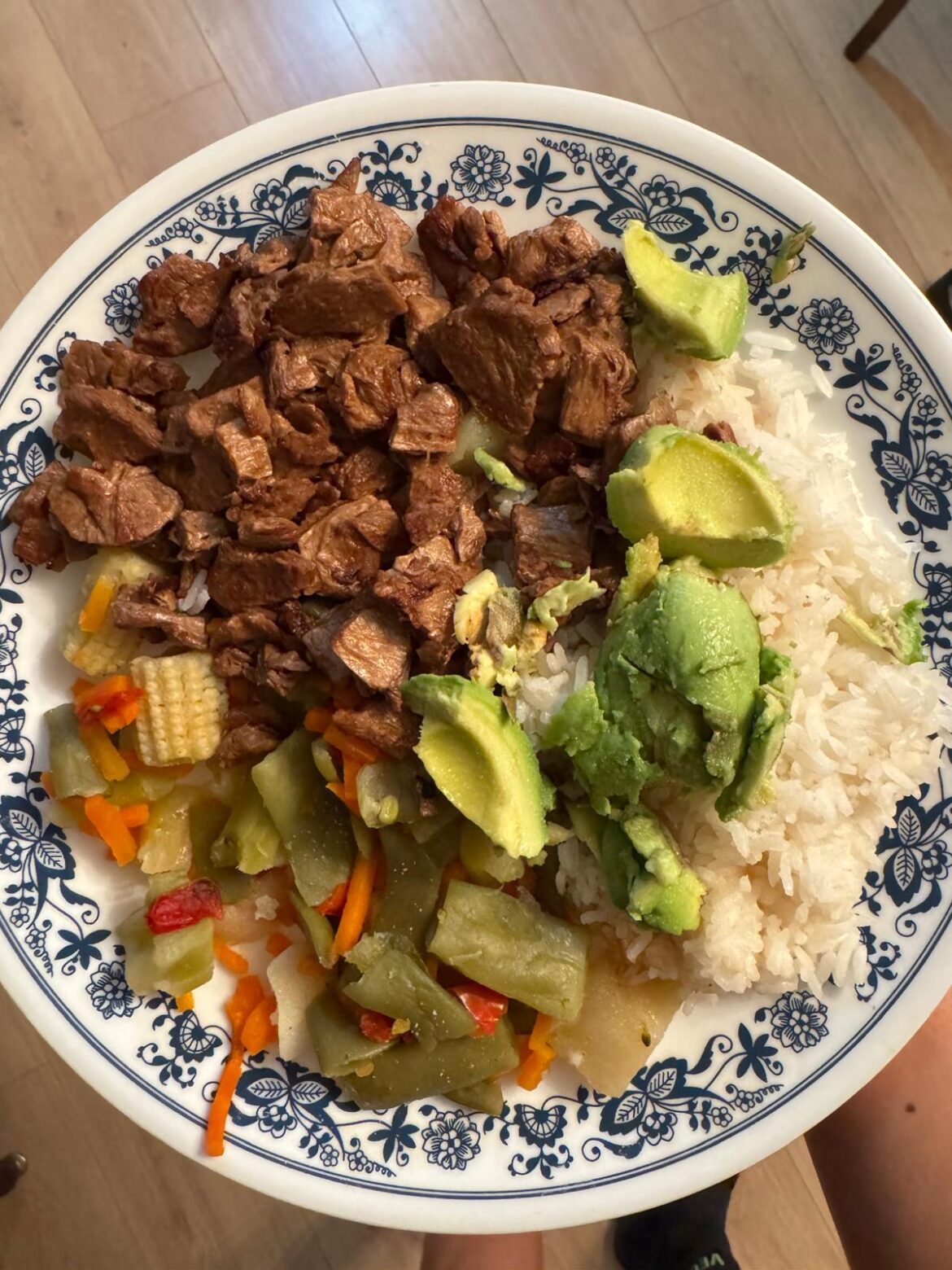 Vegan steak and mixed veggies stir fry with Jasmine rice and avocado