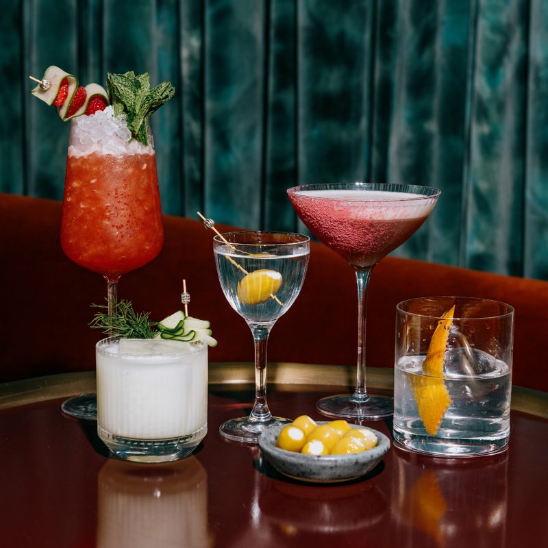 Array of colorful cocktails at Chez Zou.
