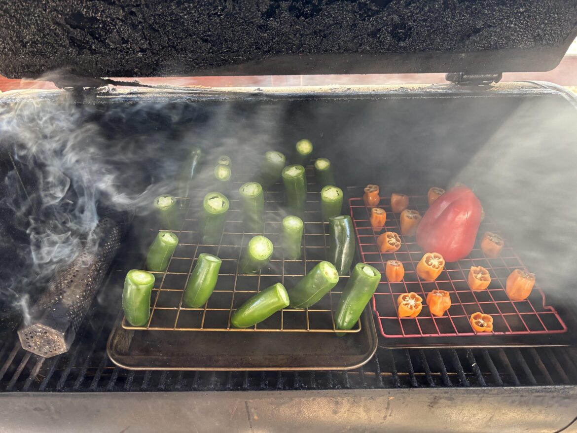 Smoking jalapenos, habaneros, and a bell pepper for a batch of salsa