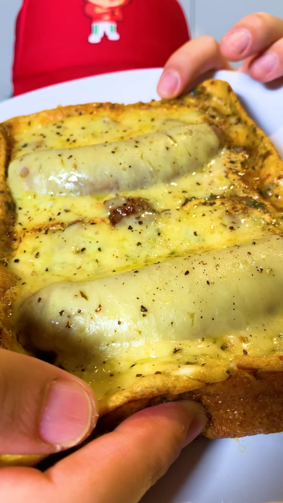 Juicy sausage and steak in eggs, finished with melted cheddar