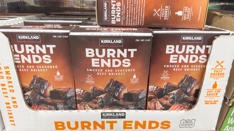 Packaged Kirkland Signature Burnt Ends in carton on shelf.