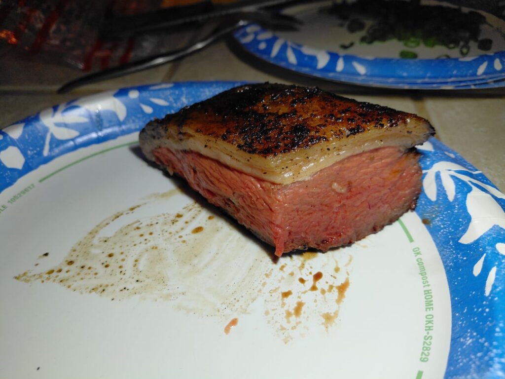 Medium rare picanha. The fat cap looks inedible but if youve never had this it melts in your mouth. My favorite cut of beef