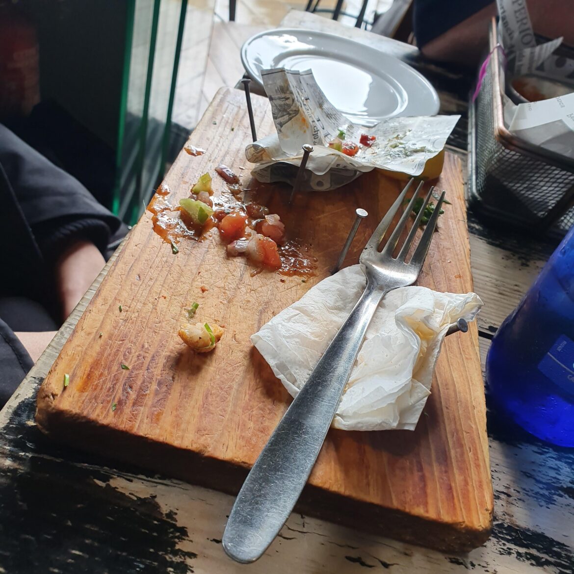 Taco board with nails in it