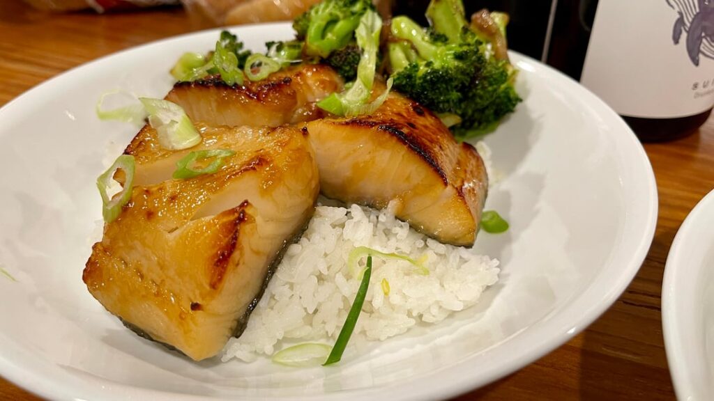 Miso black cod over rice with broccoli