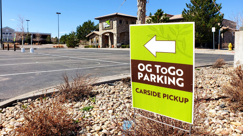 An Olive Garden to go parking sign