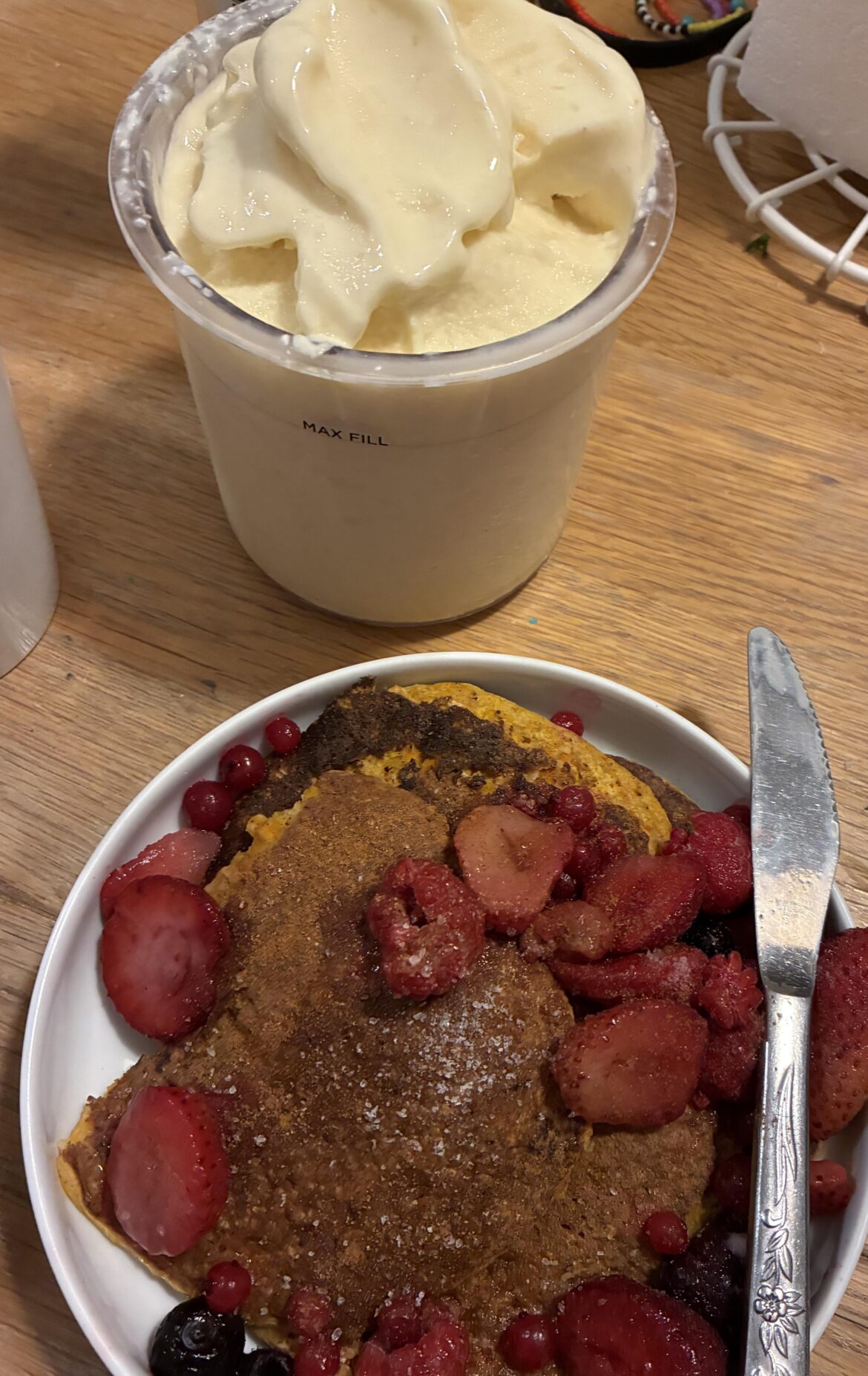 Mango frozen yogurt creami + pumpkin oat pancakes. 520 cals total