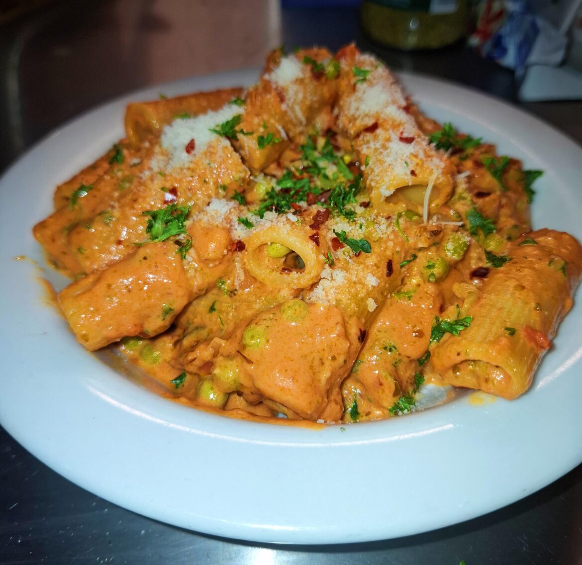 Spicy Rigatoni with tomato vodka sauce and peas