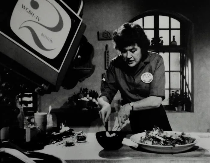 Julia Child cooking on a set