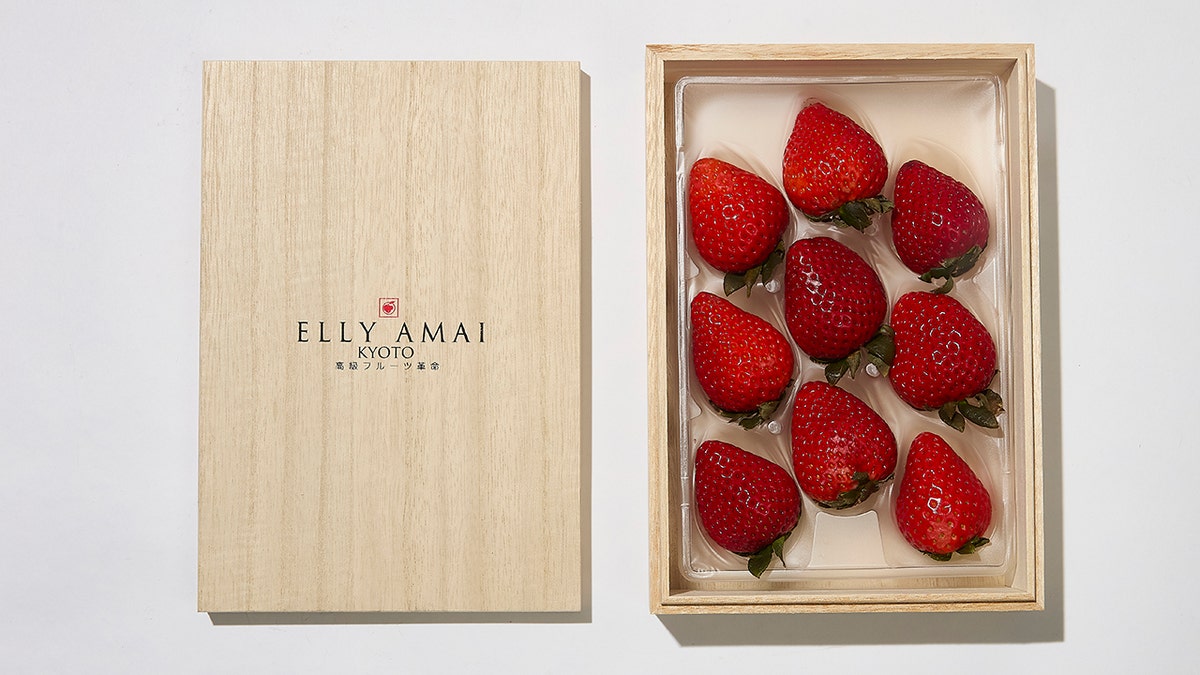 Gourmet elly amai strawberries in a wooden a box