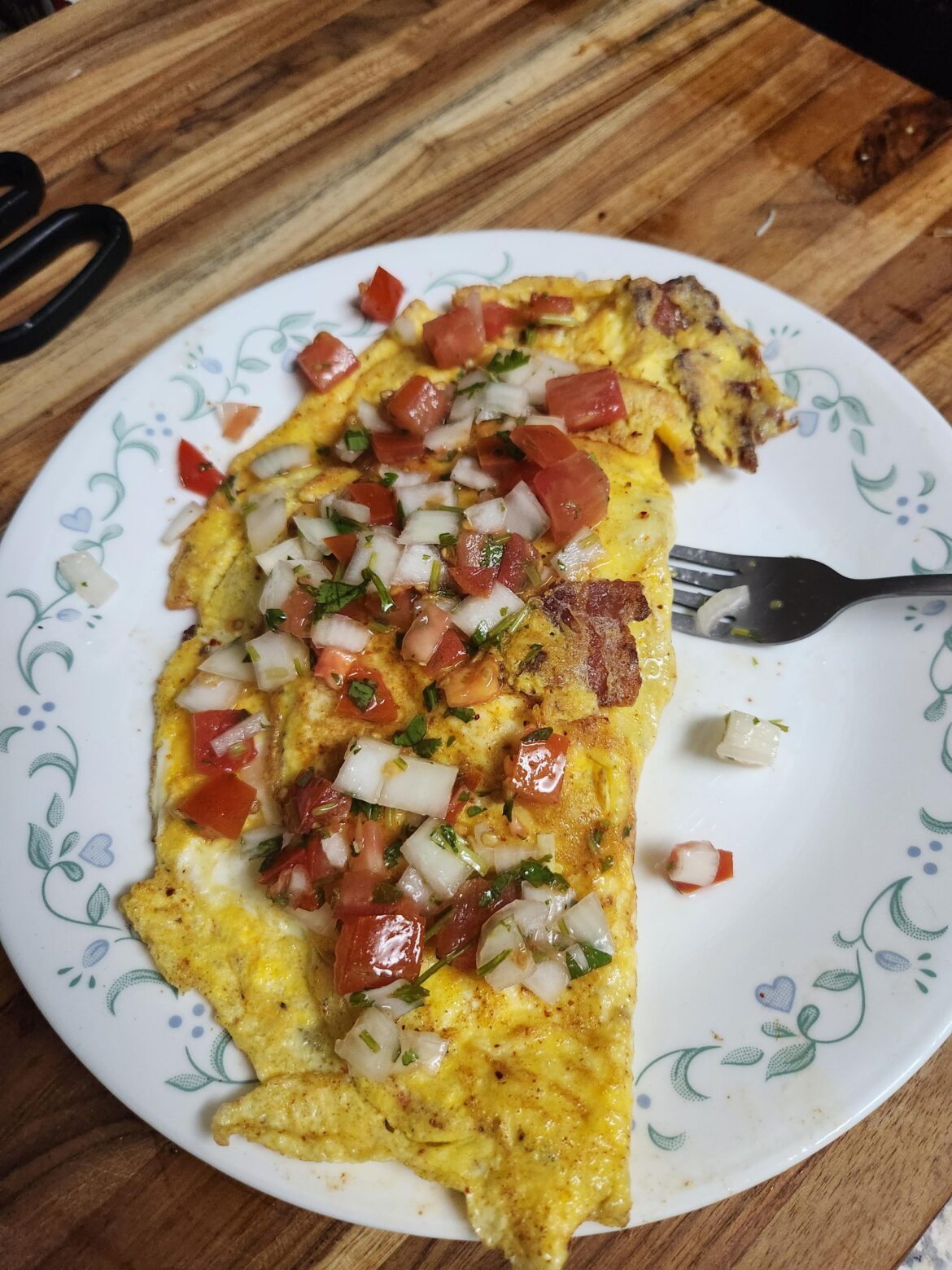 5 eggs 4 bacon plus some sobermade salsa. Don't fry bacon with no shirt on.