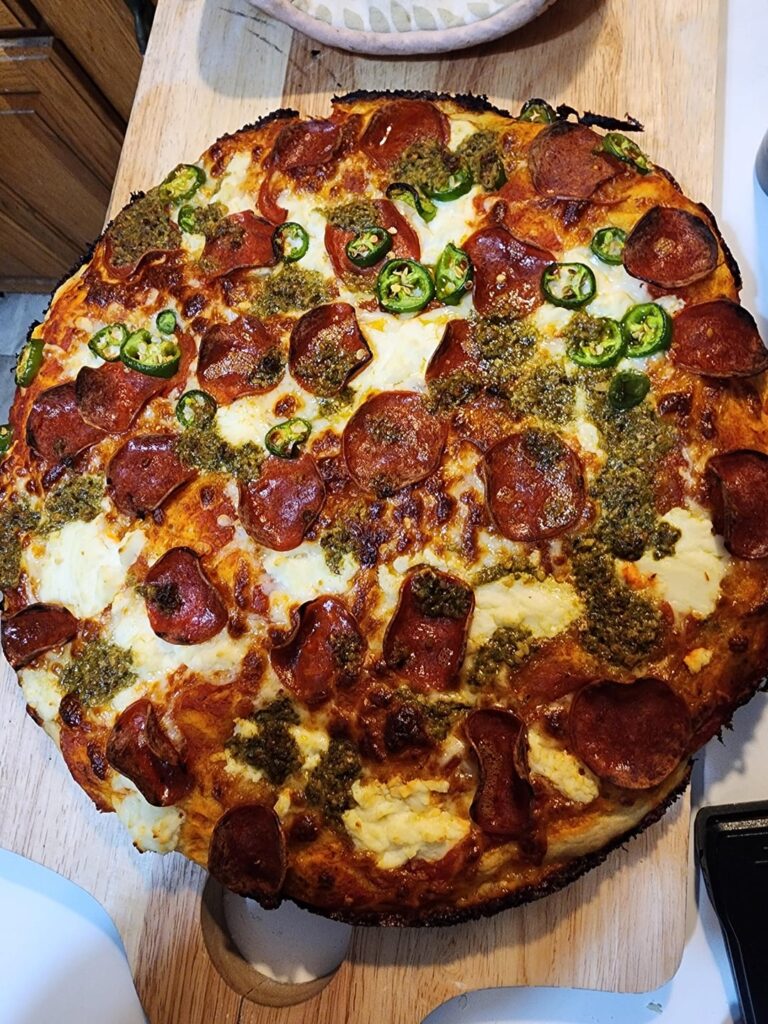 Pepperoni, jalapeño, mozzarella, ricotta, pesto