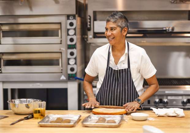Chef Preeti Mistry rolls out dough for Flakey Lachha Paratha Thursday, Oct. 17, 2024 at Central Baking Petaluma. (John Burgess / The Press Democrat)