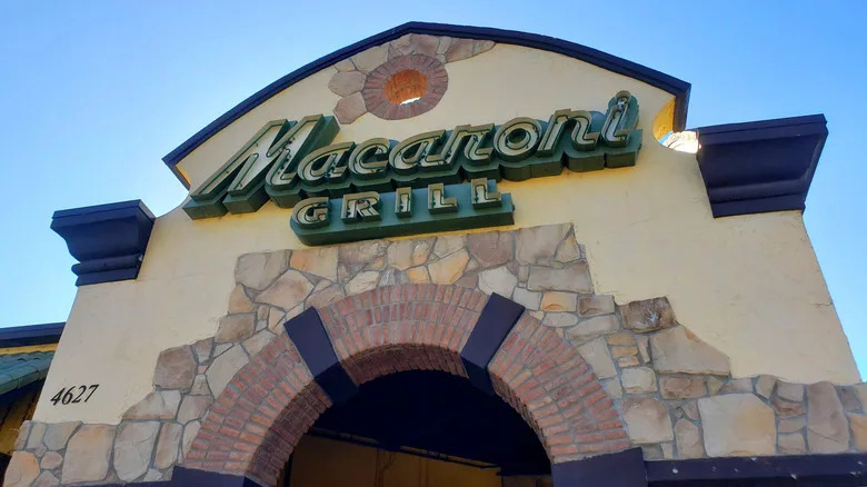 the sign and front entrance of a Romano's Macaroni Grill restaurant