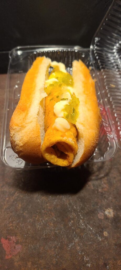 Seems to be a taquito dressed as a hot dog?