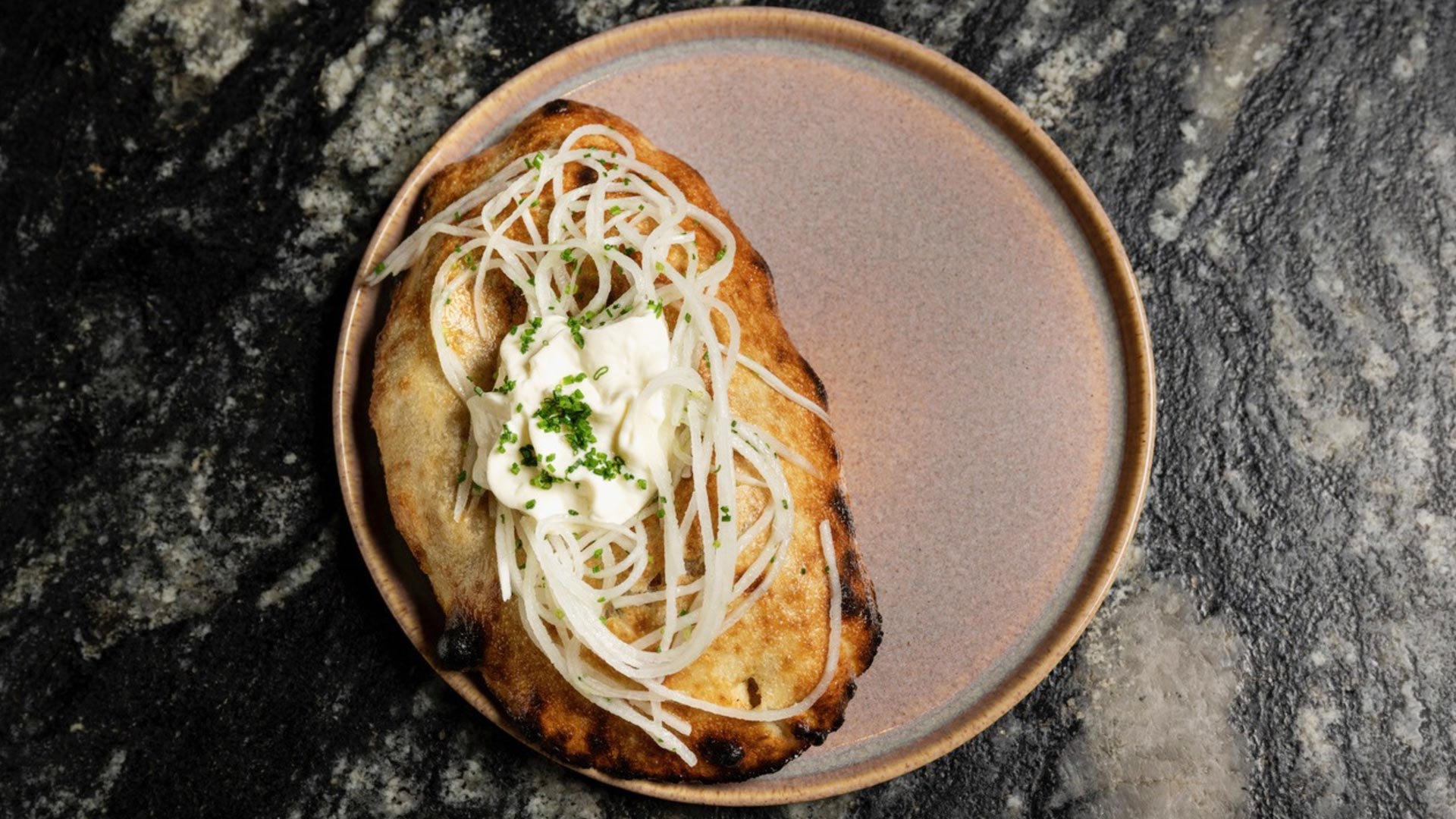 Crown Shy Tandoori Flatbread with potato, brown butter, and green Thai chili - ©Crown Shy