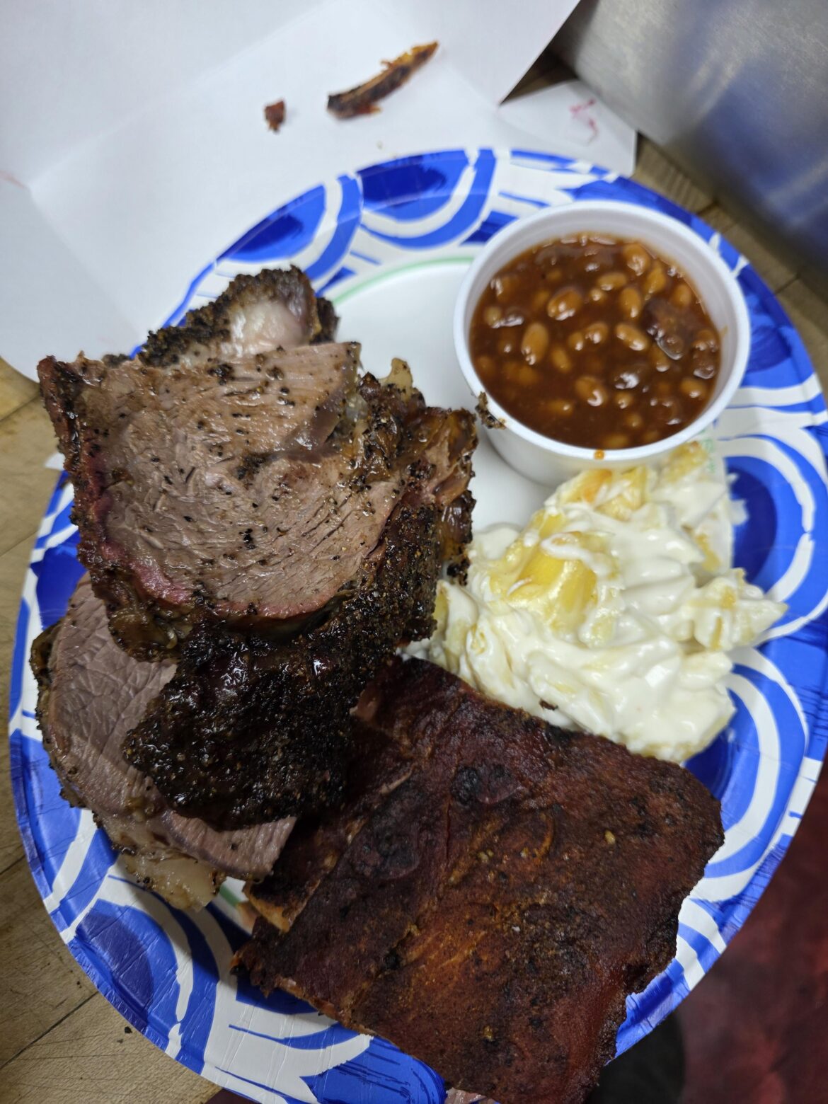 Smoked brisket, mac and cheese, and ribs, with a side of baked beans by me.