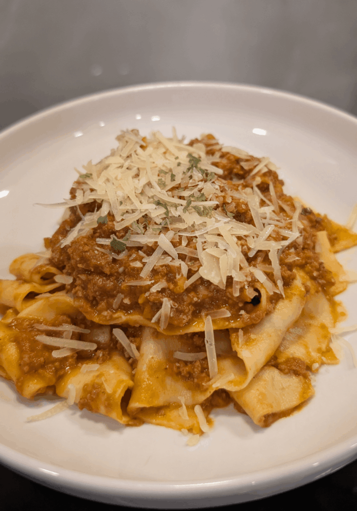Homemade pappardelle with bolognese