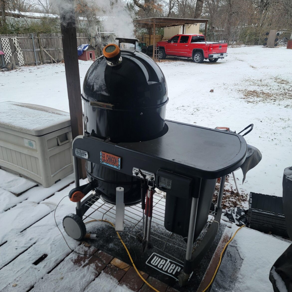 Smoking some ribs today on my 22WSM performer, temp controller helping on this cold day