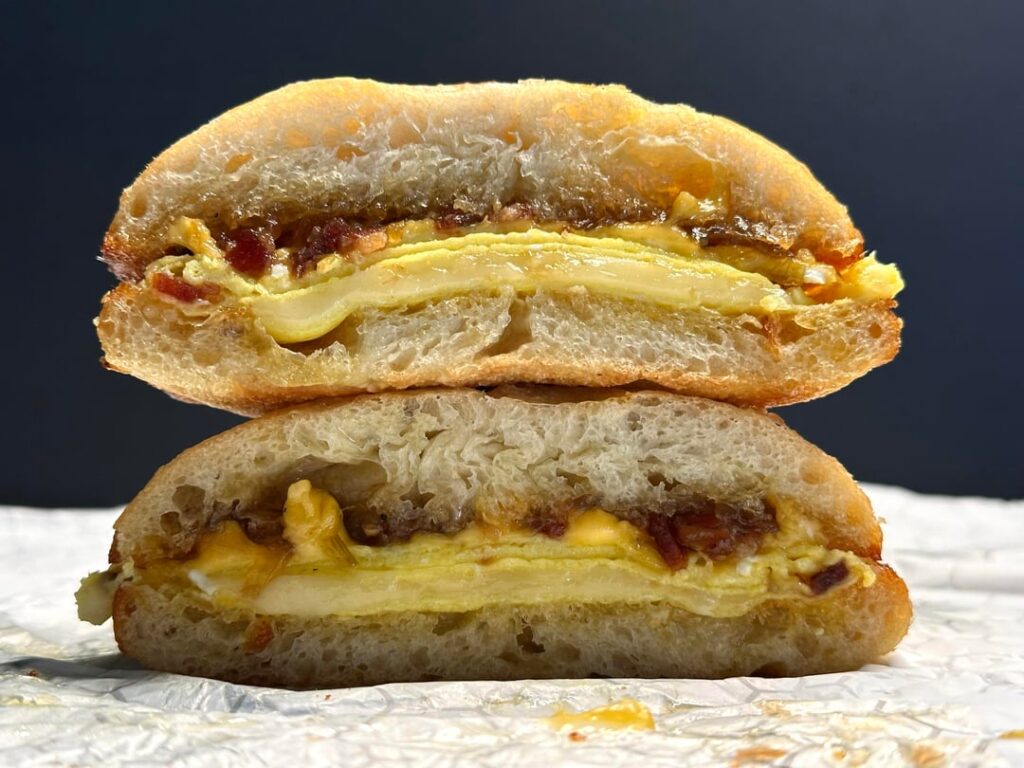 Bacon jam, egg, and cheese breakfast sandwich