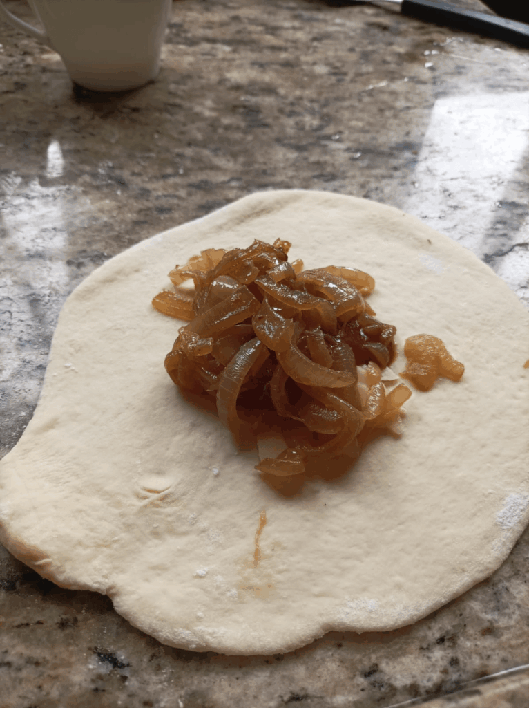Caramelized onion stuffed bread (+ cheese and tomato paste)