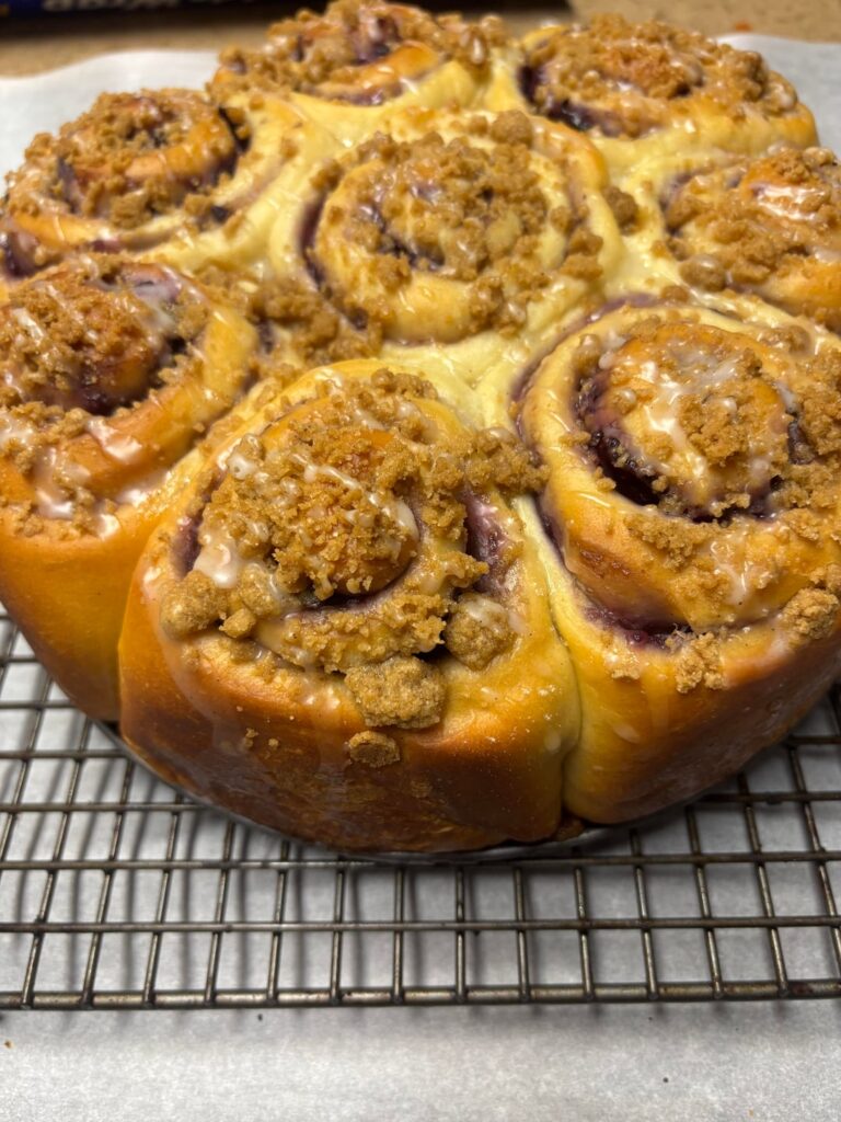 [Homemade] Wife’s cinnamon rolls w/ lemon zest and blueberry compote