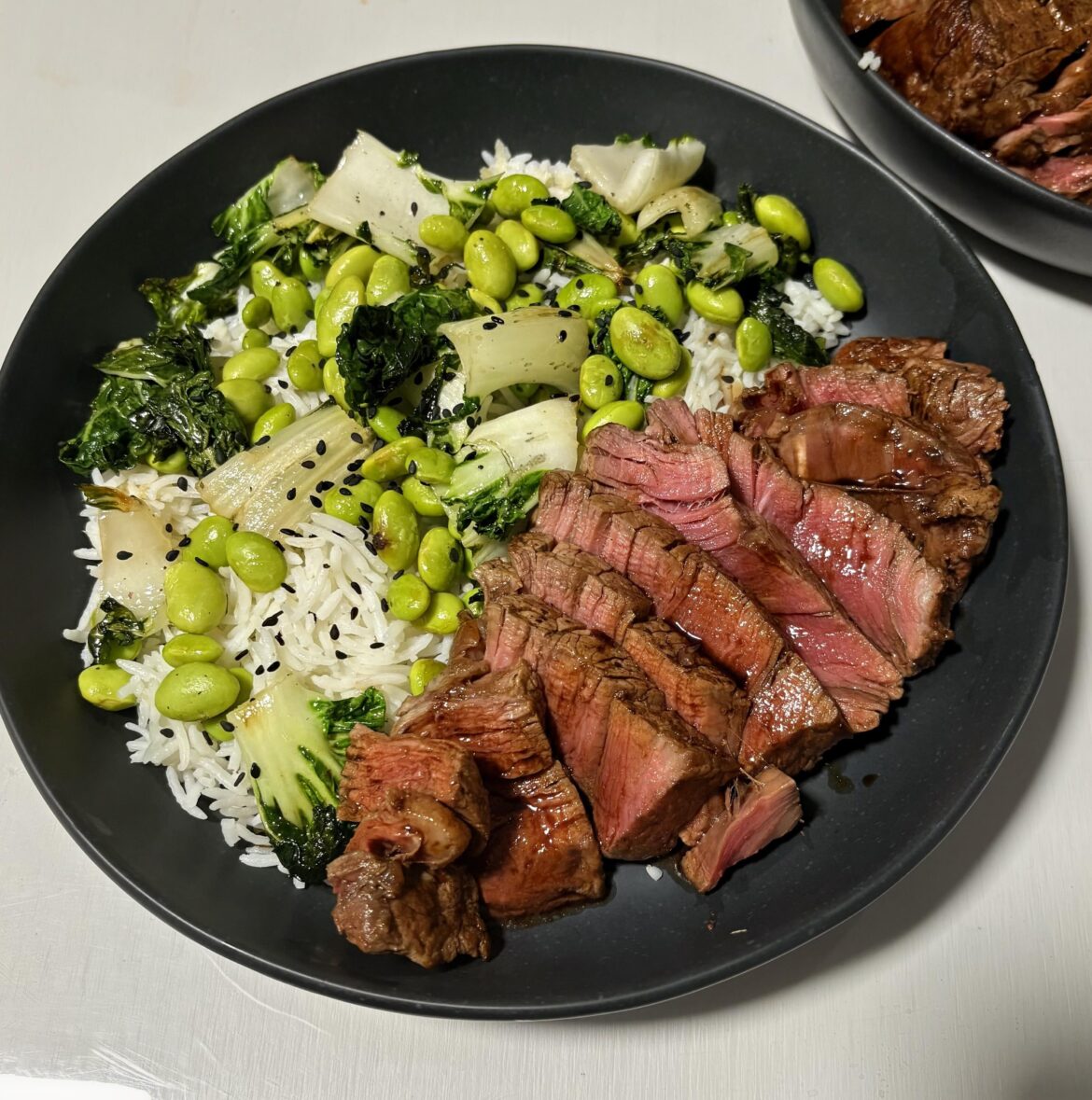 Last day of my wife cooks for me on her week off. Steak with ponzu sauce on rice with bok choy and edamame