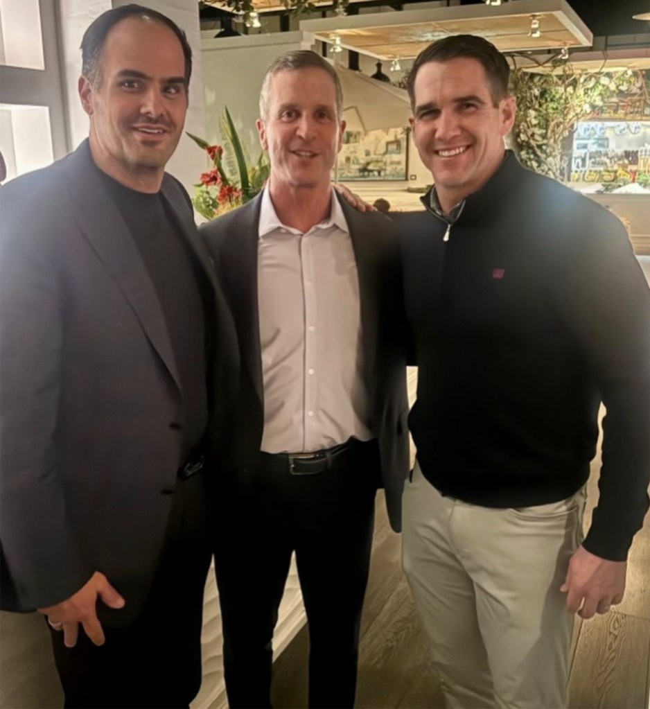 John Harbaugh smiles beside Joe Schoen at Elia Mediterranean Restaurant.