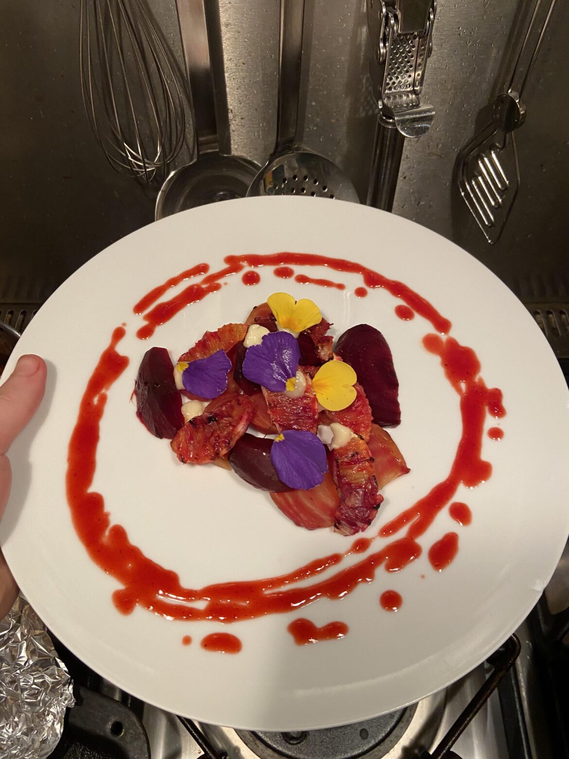 Roasted beetroot, pickled beetroot, grilled blood orange, blood orange reduction and canombare cheese Roasted beetroot, pickled beetroot, grilled blood orange, blood orange reduction and canombare cheese