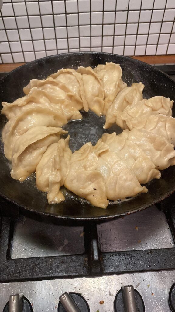 GuoTieh with pork ,mushroom, cabbage,spring onions.