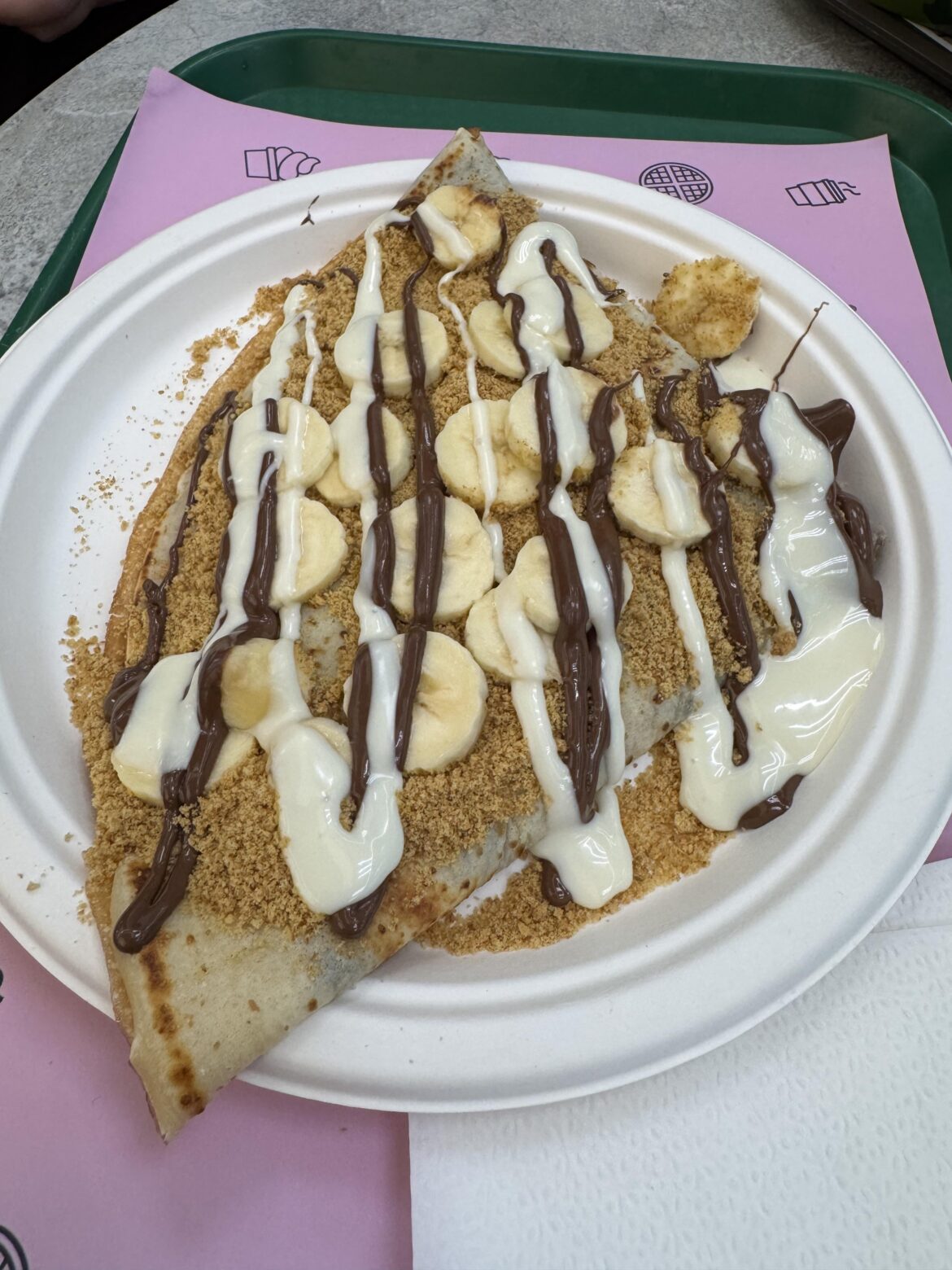 Crepe with white & dark chocolate, banana and crushed cookies – pure comfort food