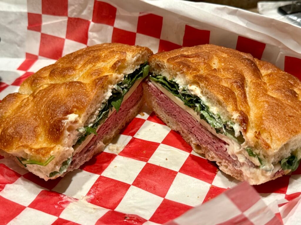 Roast beef, swiss, arugula, and horseradish mayo spread.