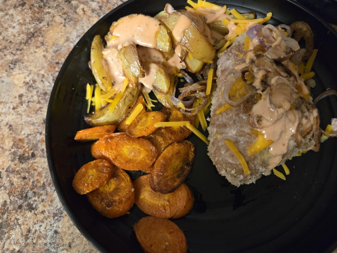 Cheddar Stuffed Meatloaves with potato wedges, carrots, crispy shallots & special sauce Cheddar Stuffed Meatloaves with potato wedges, carrots, crispy shallots & special sauce