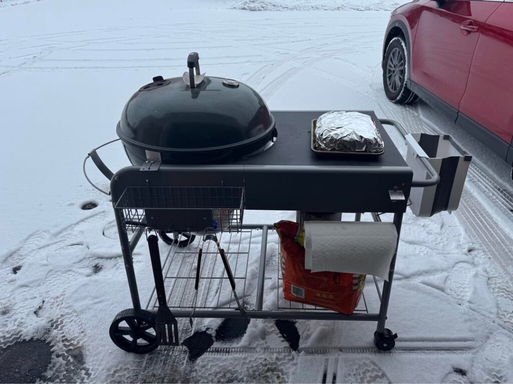 Perfect day today in Wisconsin to smoke a 9lb pork butt with a charcoal snake.