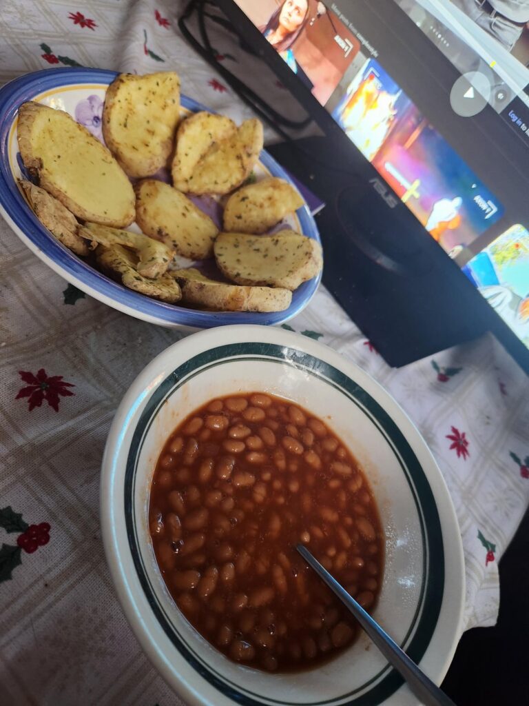 My meal: baked beans and sliced potatoes