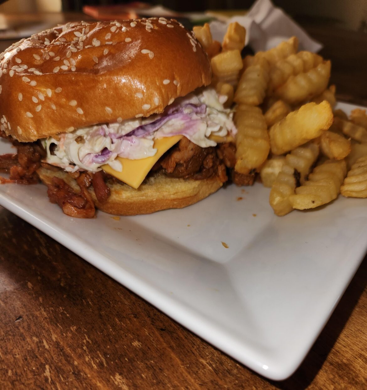 Pulled pork with american cheese and slaw