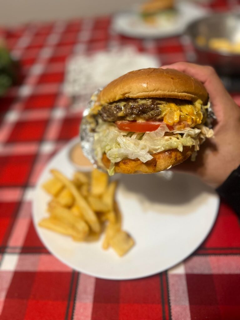 an amazing homecooked 1/2 lb burger