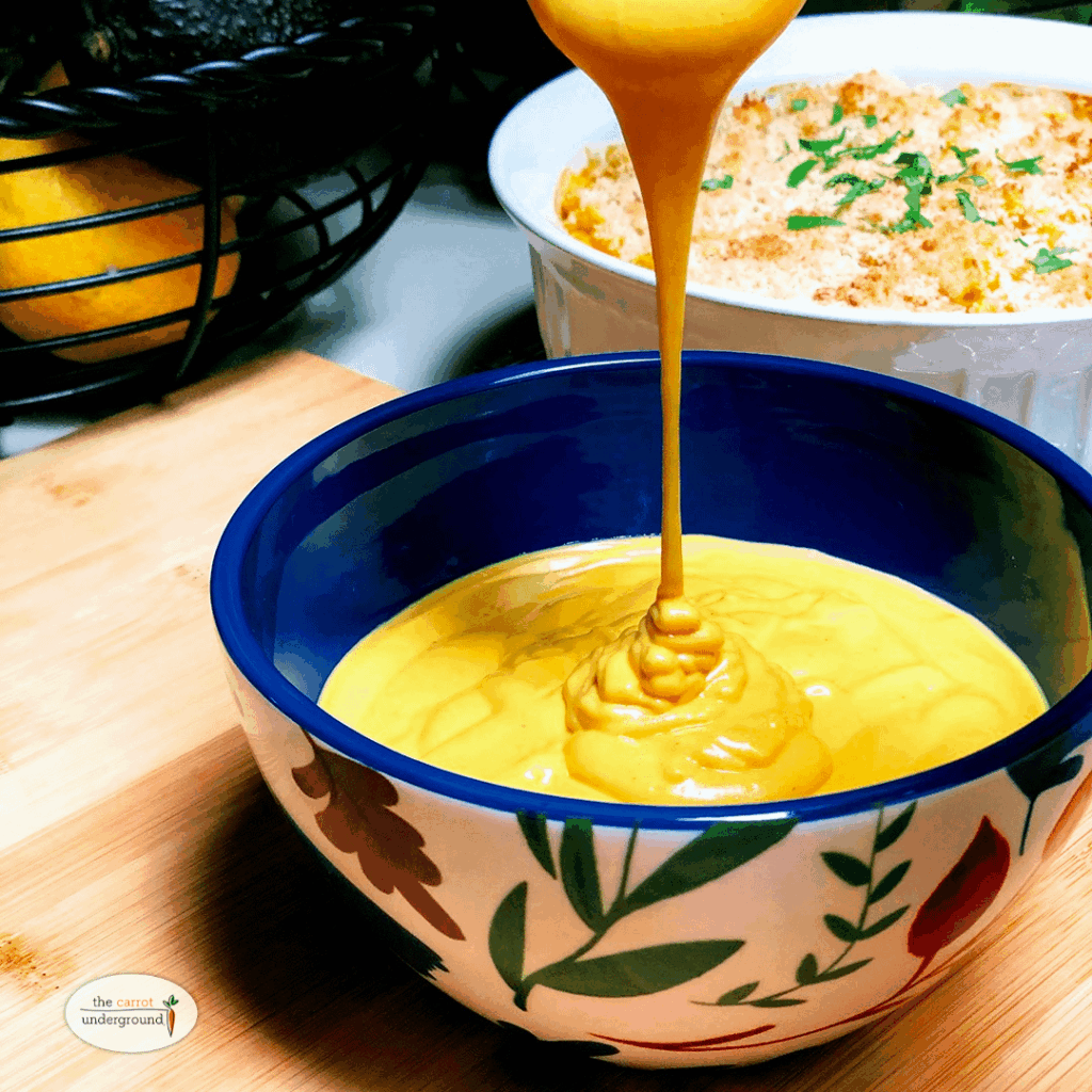 Easy Vegan Cheese Sauce 🧡 a creamy, dreamy, cheddary cheese sauce made with simple plant-based ingredients.