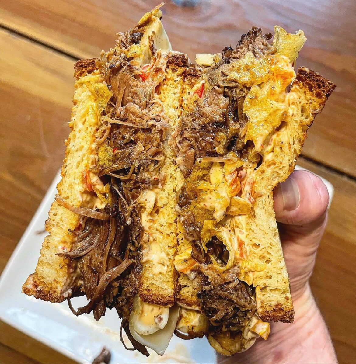 Pot roast, provolone, Russian dressing, potato chips.