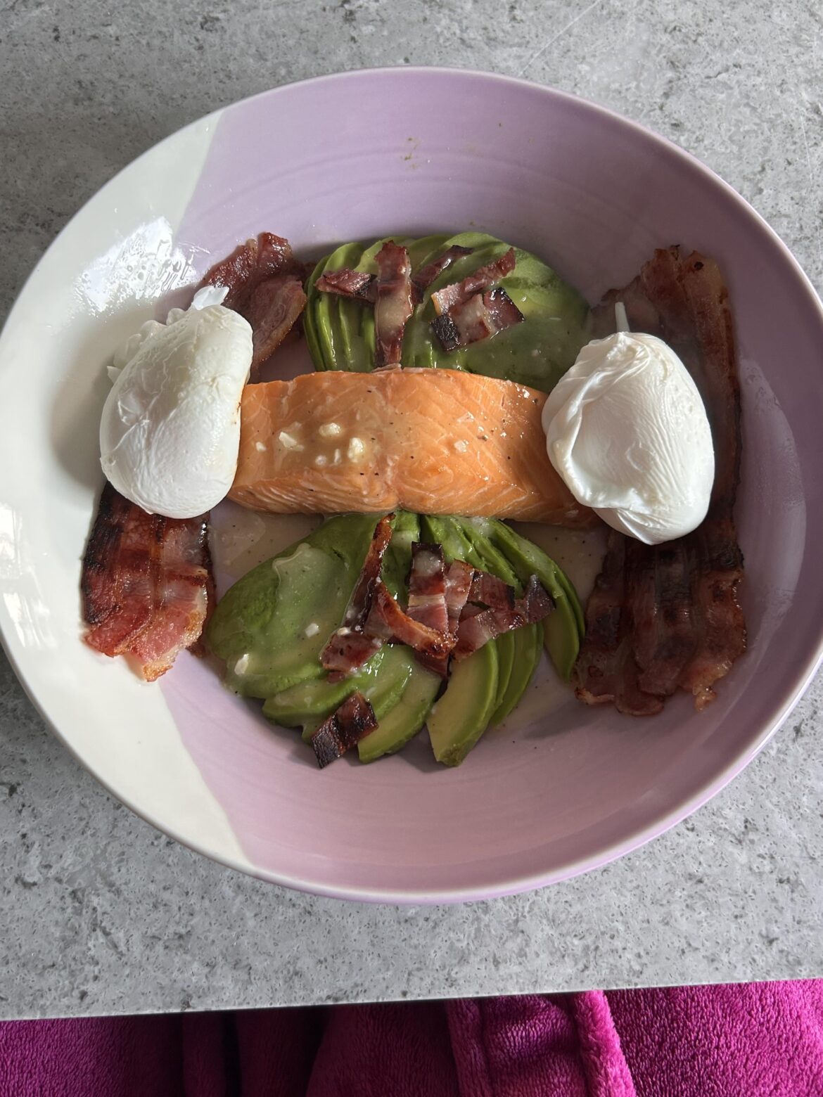 Hot smoked salmon, avocado, smoked streaky bacon and poached eggs with a lemon and horseradish dressing