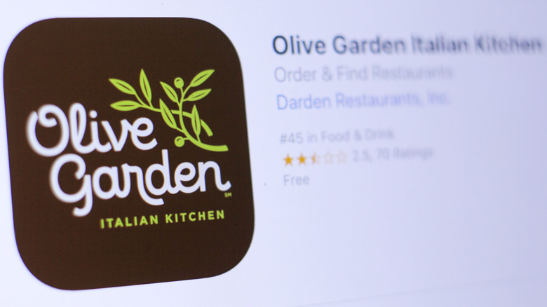 A photo of a screen showing an Olive Garden app in the app store