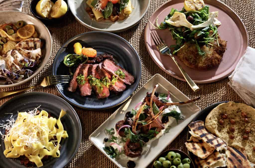 A table full of food on plates