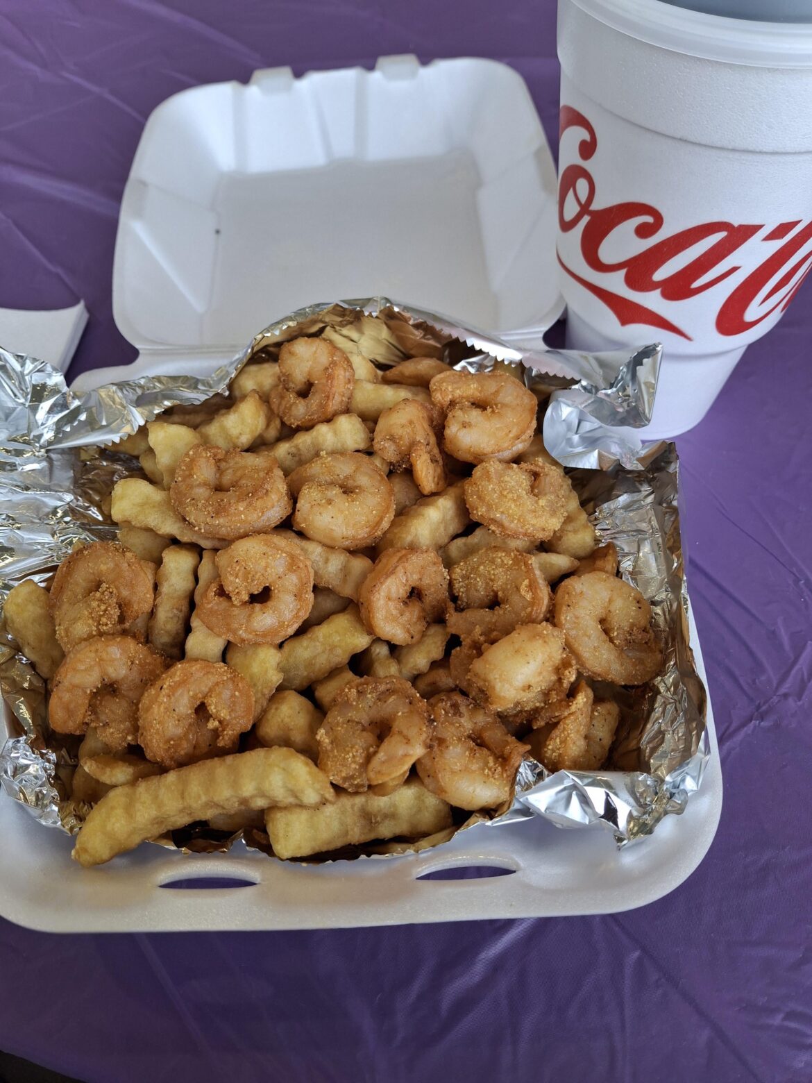 Fried shrimp and fries with coke