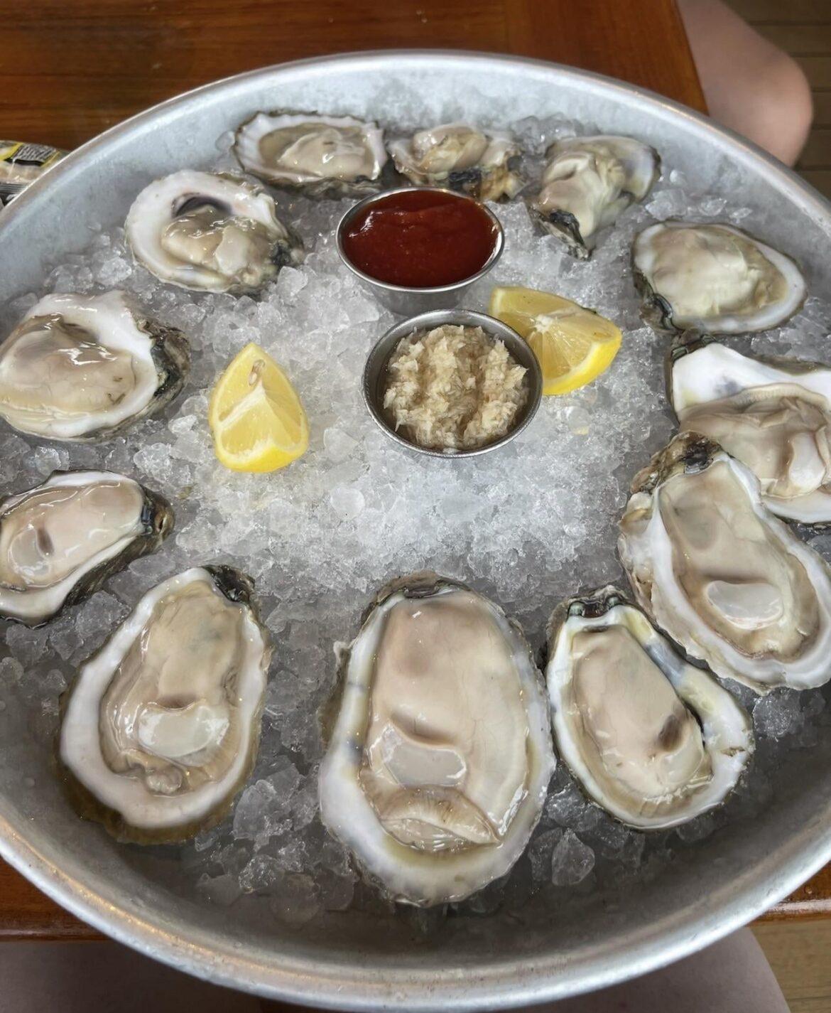 Raw oysters with lemon and hot sauce Raw oysters with lemon and hot sauce