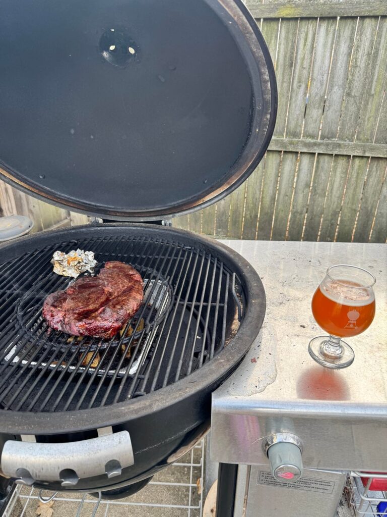 Smoked chuck roast sandwich with caramelized onion and a horseradish mayo sauce, on the Summit Kamado.