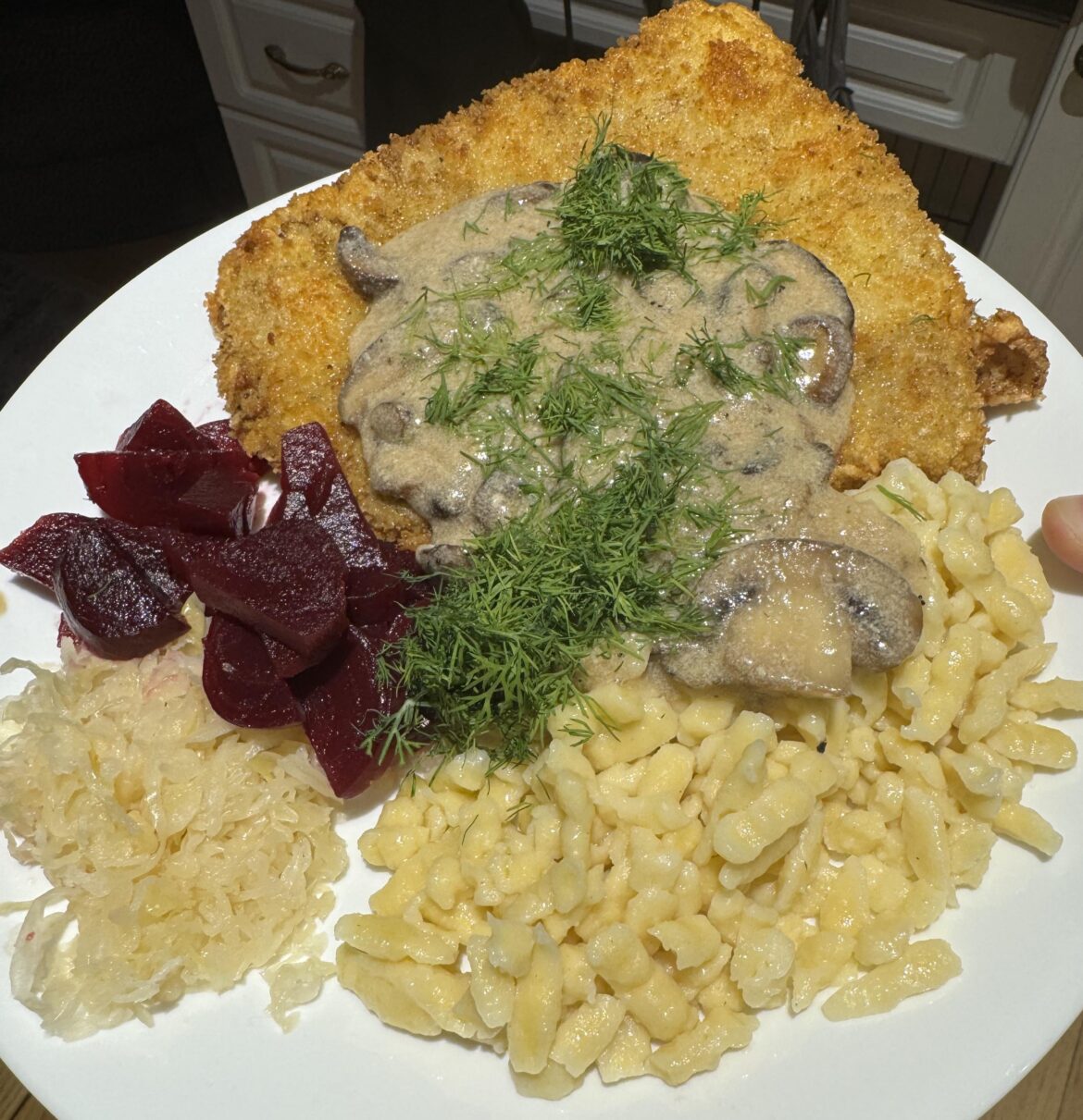 [Homemade] schnitzel dinner complete with jaeger sauce and spaetzle.