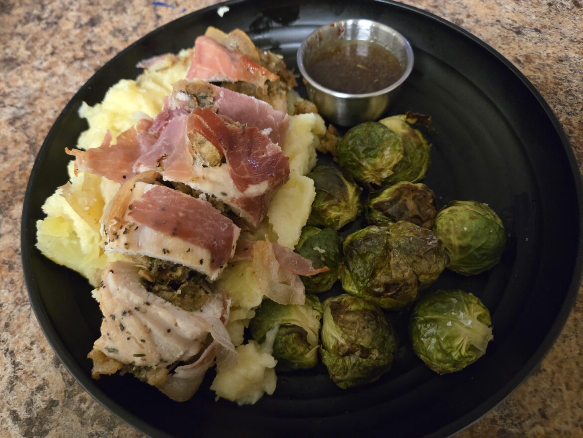 Prosciutto-Wrapped Herb-Stuffed Chicken with Cranberry Pan Sauce & Roasted Brussels Sprouts