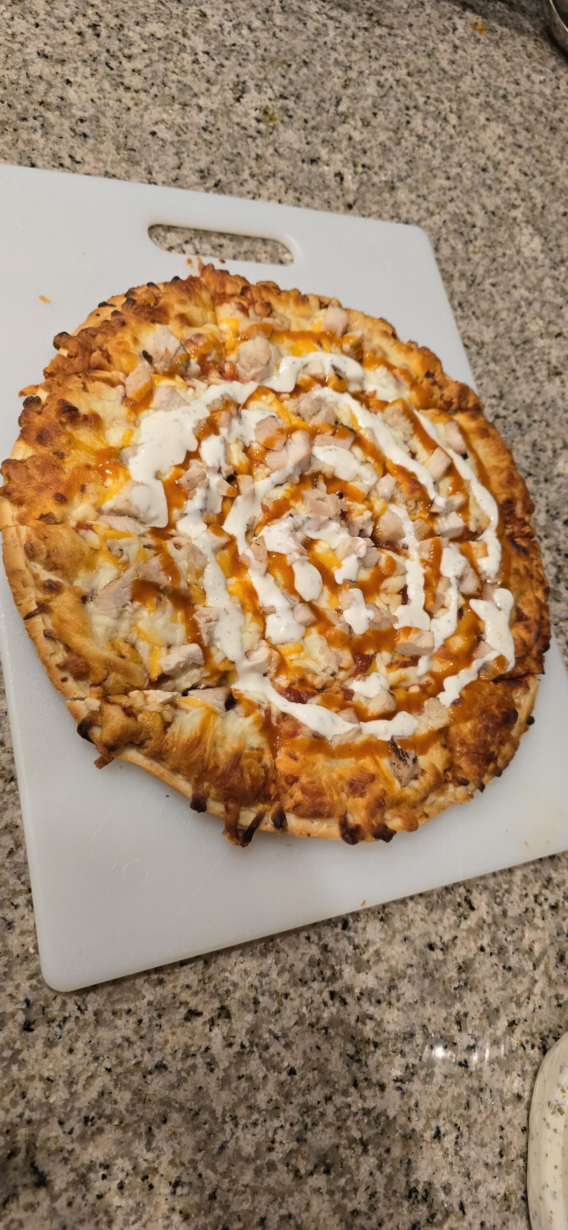 Dressed up frozen pizza